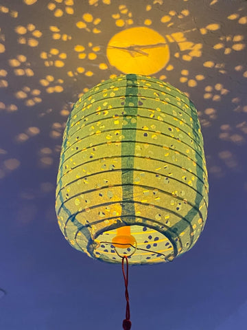 Metany orange paper lantern creates lively focal points for events