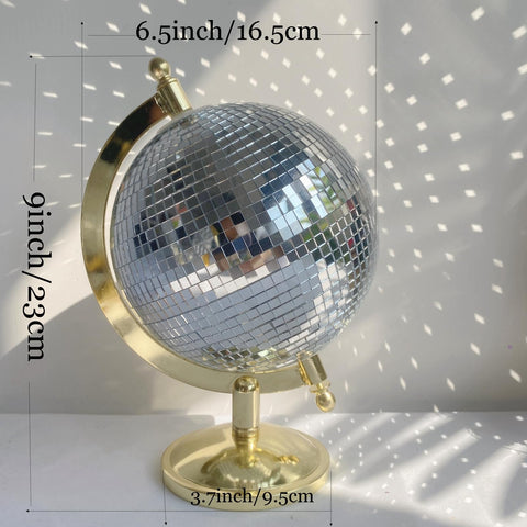 MFGDISCO gold metal stand complements the globe's finish.
