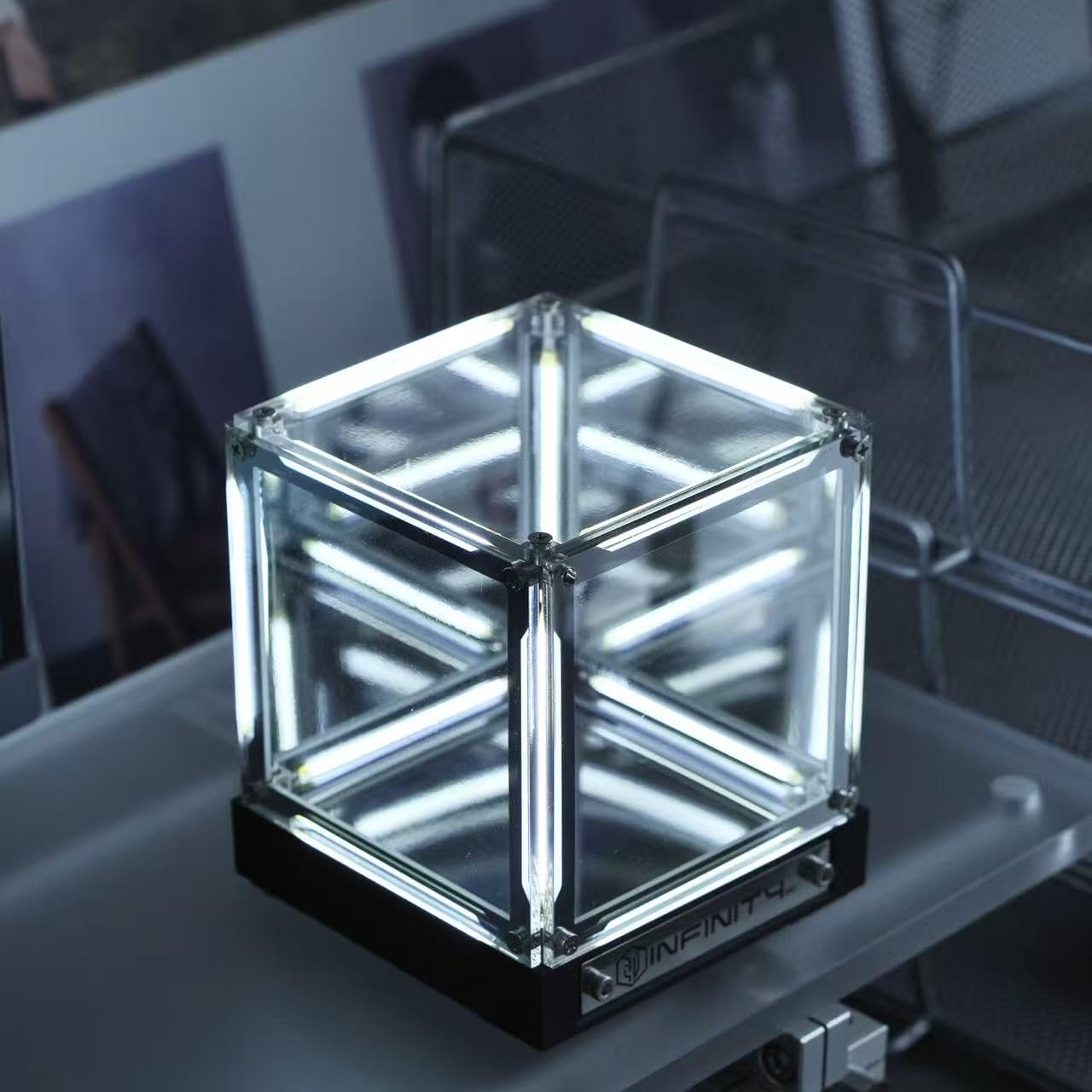 Mhaohuofu Infinity Cube Light front angle with blue LEDs for futuristic desk ambiance