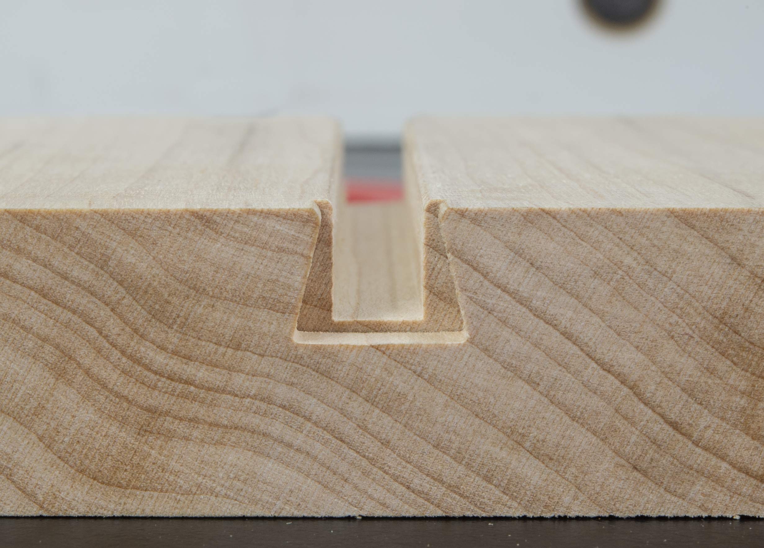 Microjig relief bit extends dovetail bit life by lowering pre-cut stress
