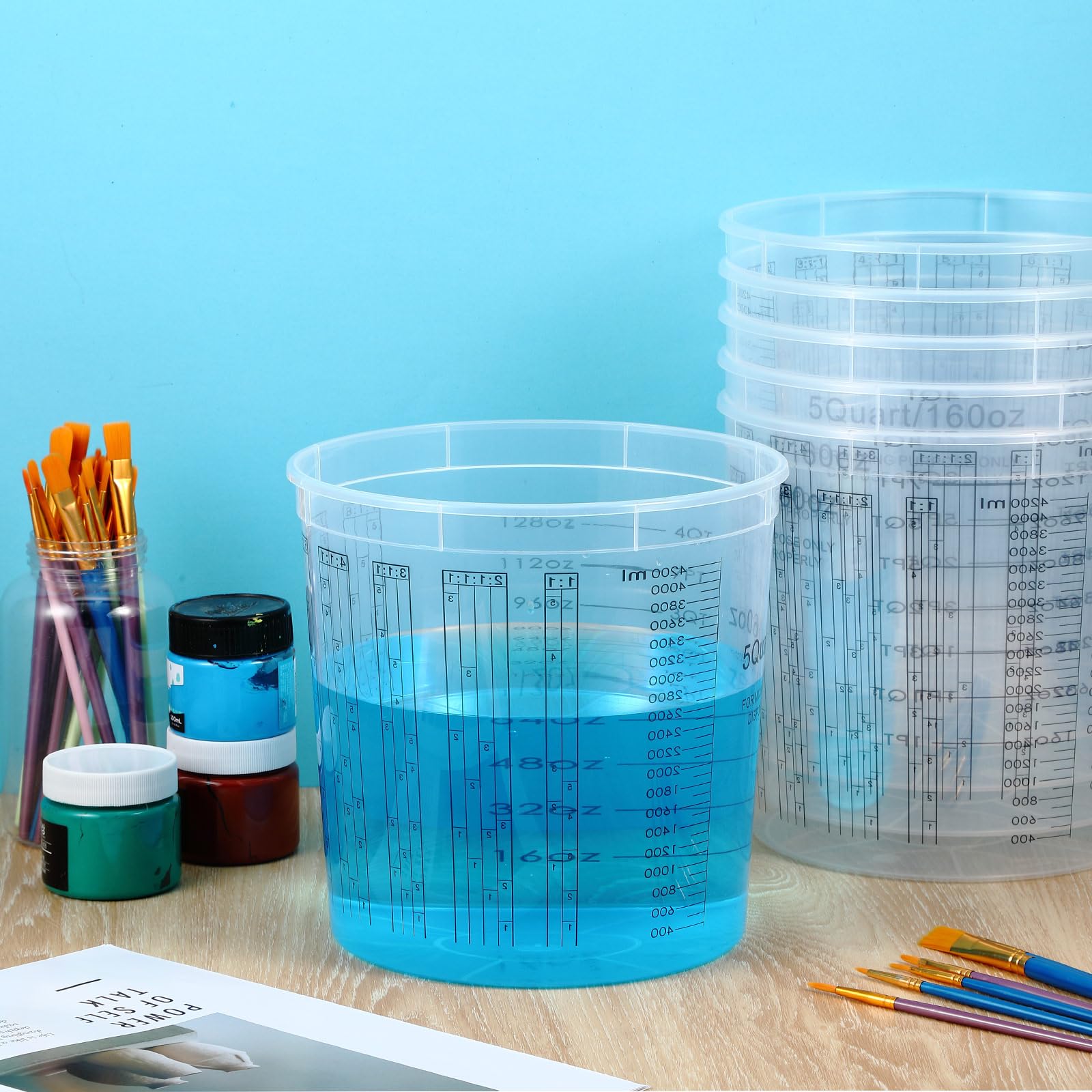 Mifoci cups with side scale for quick, accurate paint ratios.