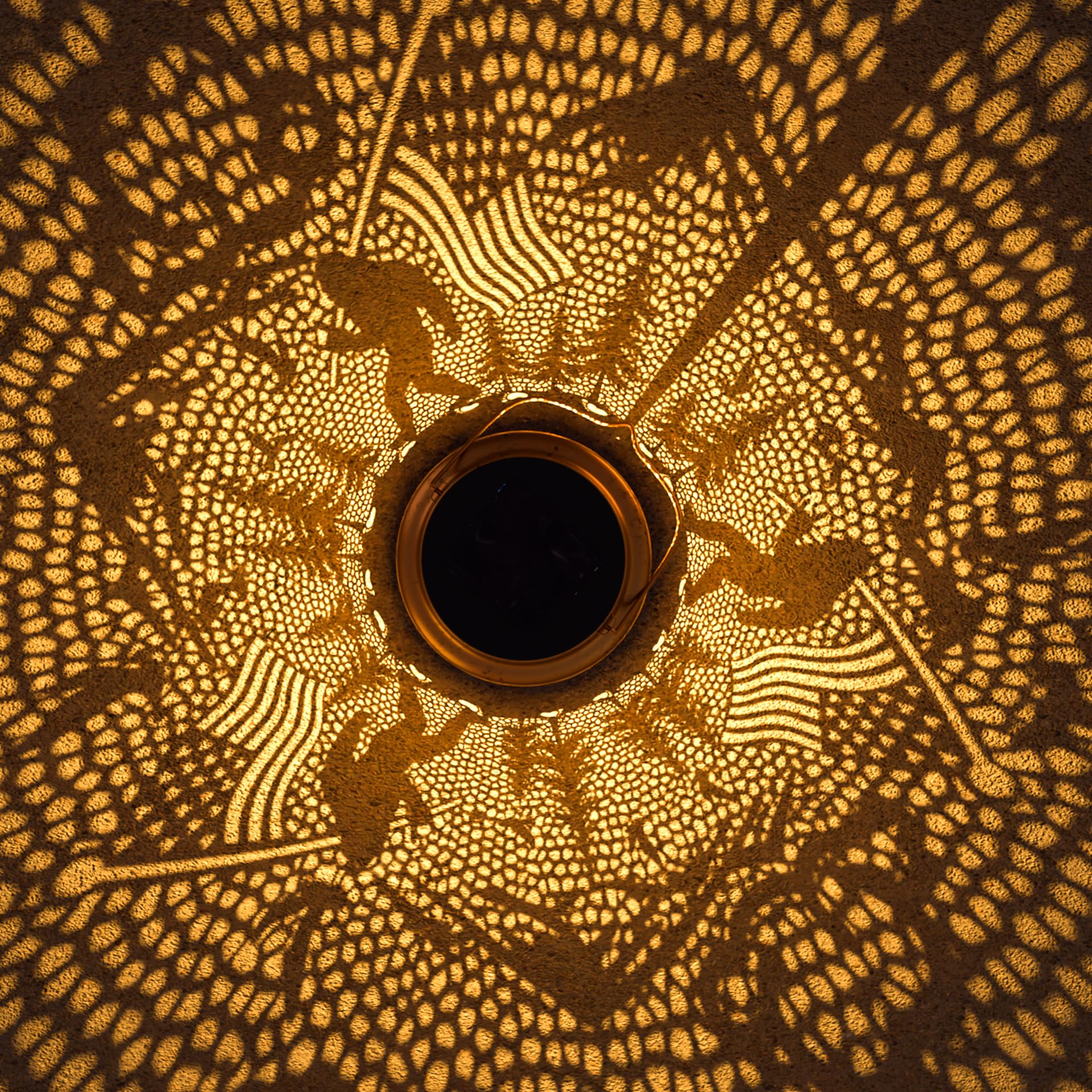 Miggley Bigfoot solar lantern garden sconce lights up garden accents.