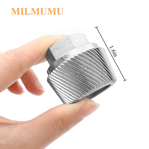 MILMUMU tool being tapped to seat within drain for secure fit.