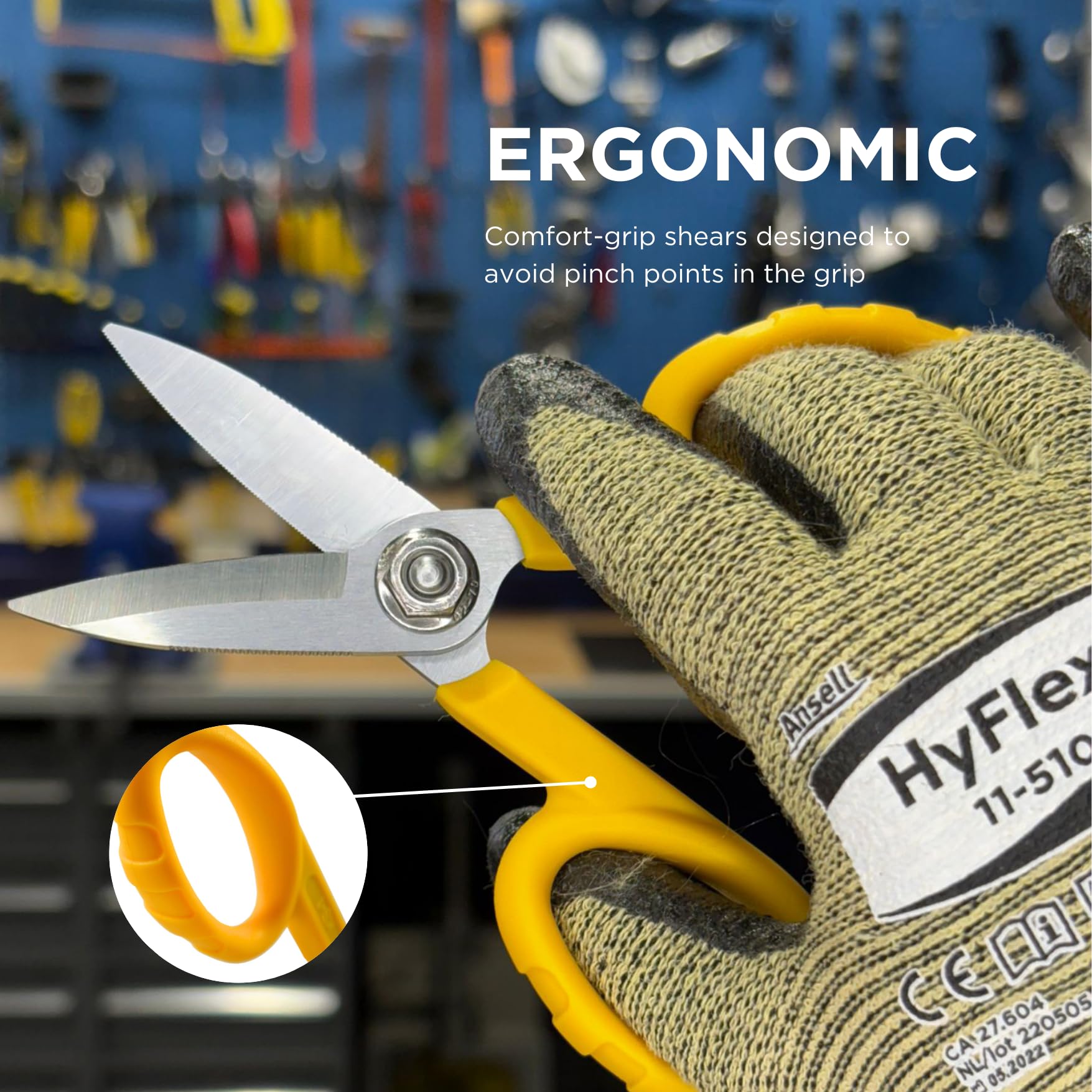 Miller KS-1 yellow scissors cutting Kevlar demonstrates precise fiber cuts