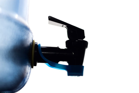 Milunova Spigcap USA-patented design clips on to prevent spills.
