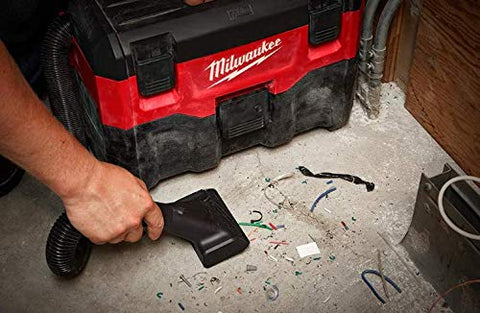 Milwaukee 0880-20P vacuum showing crevice tool in tight space.