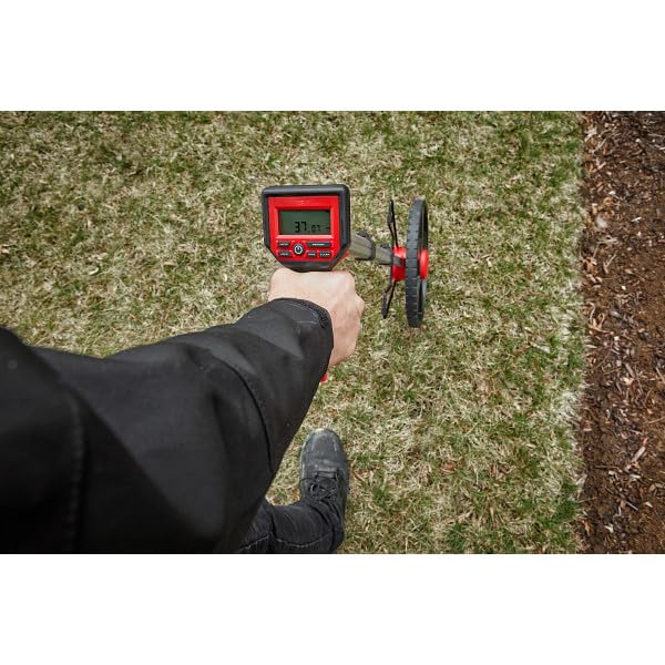 Milwaukee 12in digital measuring wheel durable body withstands daily construction use.