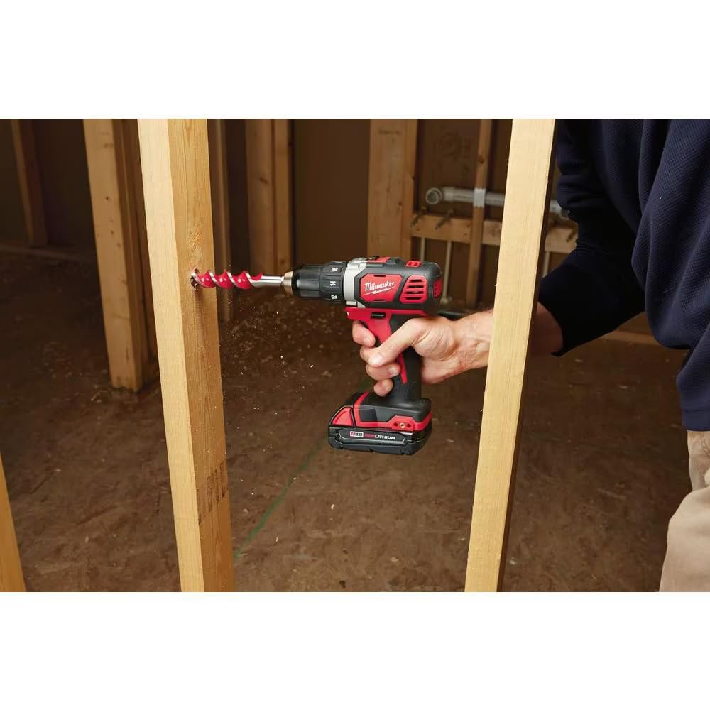 Ergonomic handle on Milwaukee 18V drill-driver for improved control.