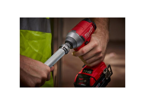 Milwaukee conduit reaming bit holder in use, secures standard bits for efficient channel preparation.