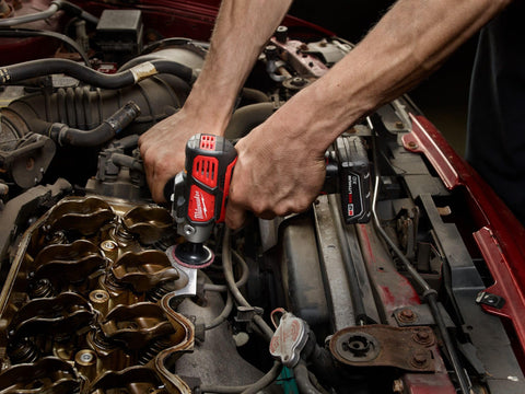 Milwaukee cordless polisher side handle for improved control.