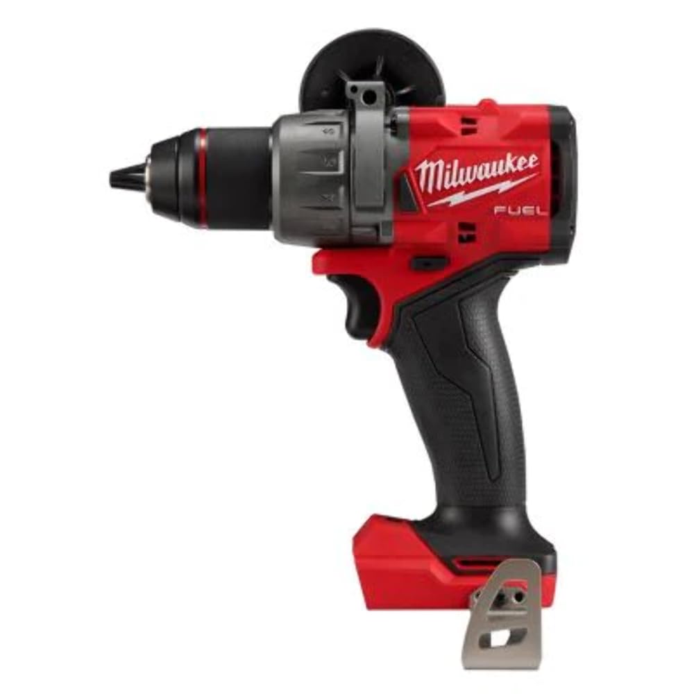 Milwaukee M18 Fuel 1/2 inch hammer drill-driver in hand, showcasing rugged performance for tough jobs