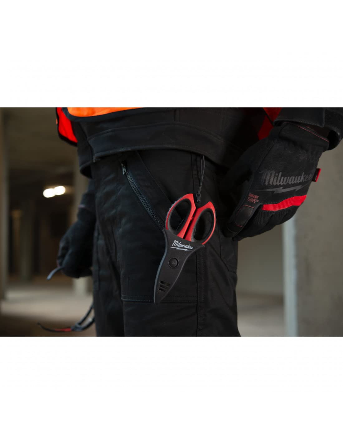 Milwaukee scissors with tool holder and belt strap for quick reach during work