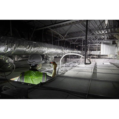 Milwaukee flashlight outdoor-work session showcases versatile lighting for job sites.