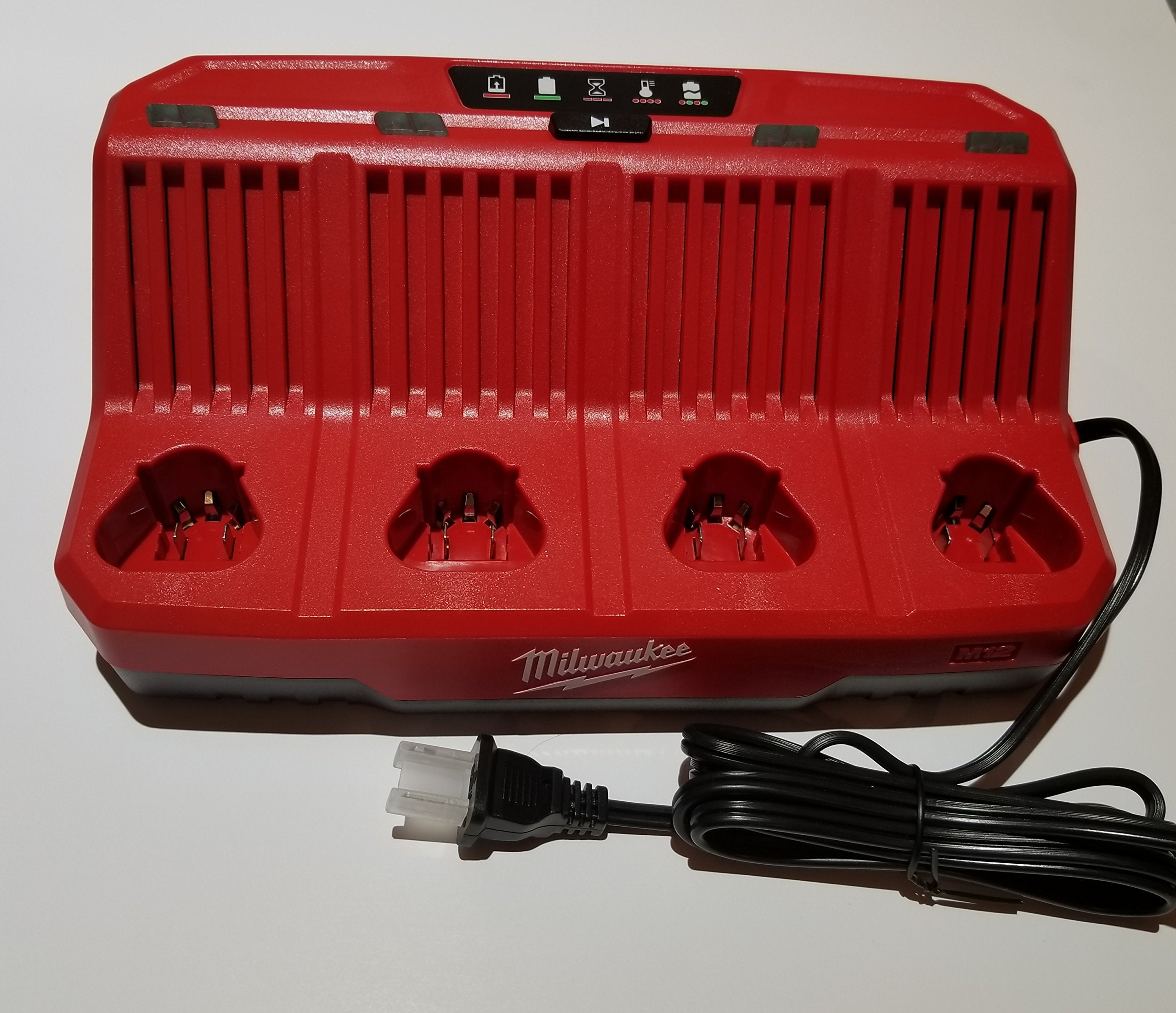 Milwaukee M12 Four Bay Sequential Charger charges four M12 batteries in sequence for extended tool use.