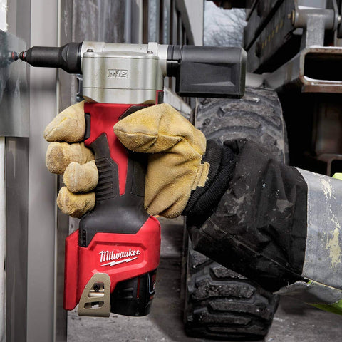 MILWAUKEE M12 tool delivering 450 rivets per charge on 1/8 inch steel rivets