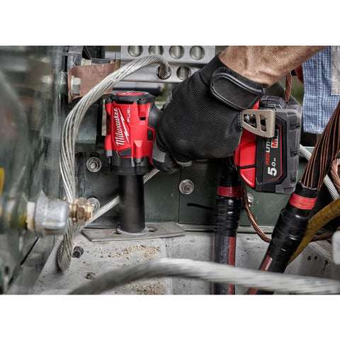 Milwaukee M18 FUEL 3/8-inch compact impact wrench battery area shows easy access and compatibility