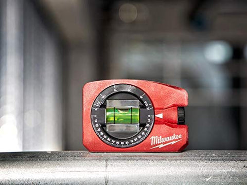 Milwaukee Magnetic Pocket Level 78mm in use, magnetic hold enables hands-free checks.