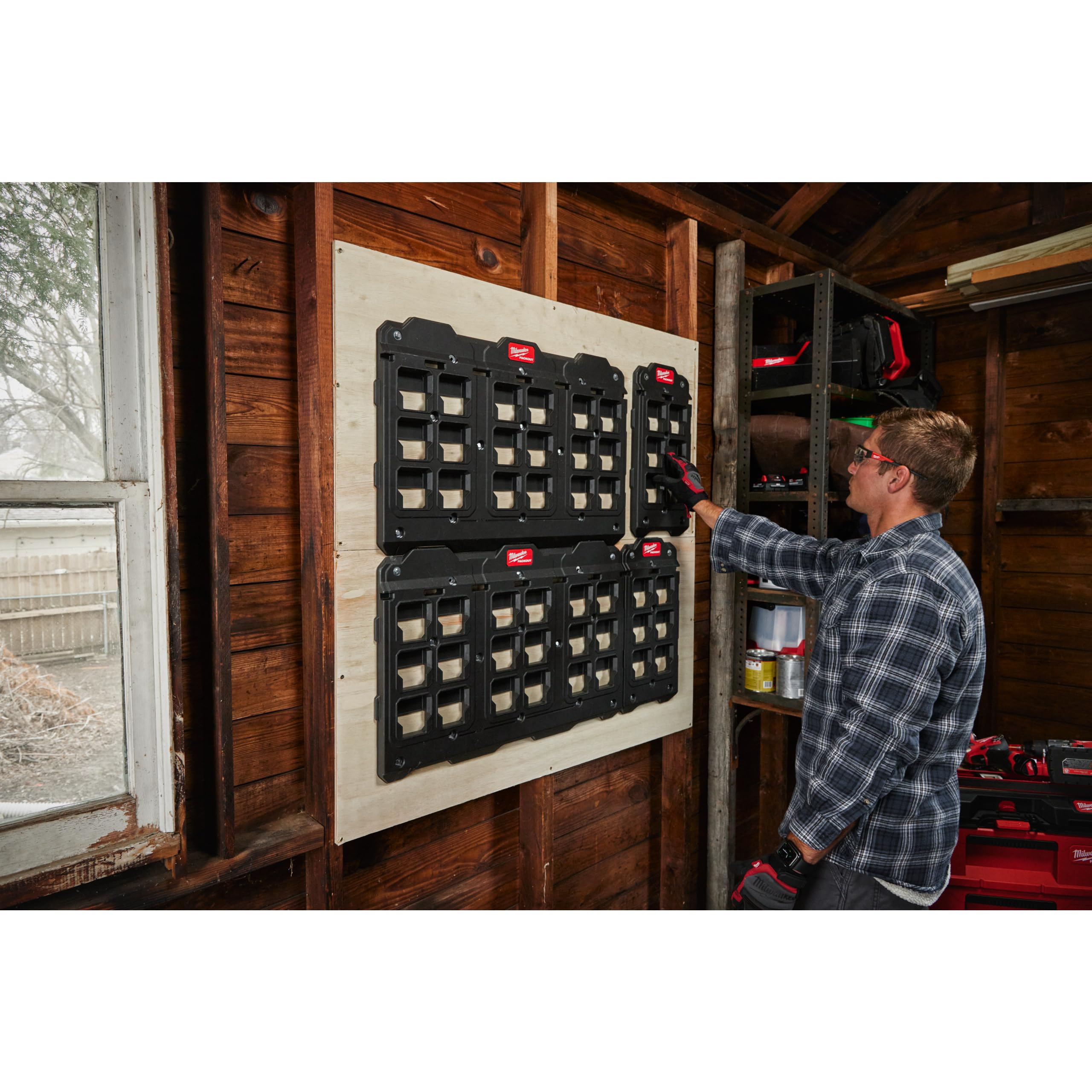 Milwaukee Packout compact mounting plate organizes tools in a compact workspace.