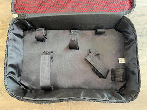 Milwaukee Tool Bag contents arranged for quick transport between sites.