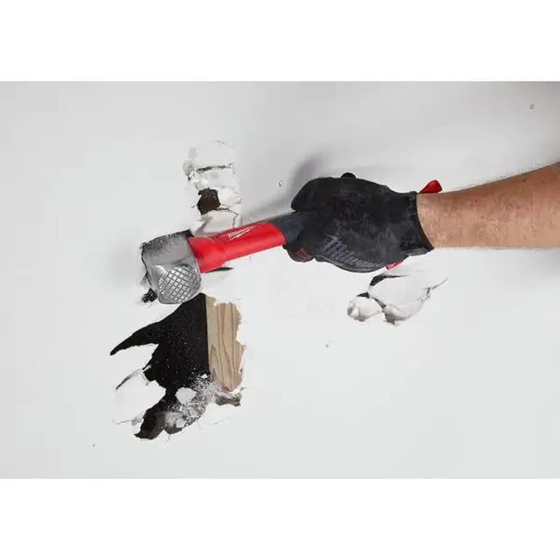 Milwaukees 3lb drilling hammer in use demonstrates versatile driving and chiseling tasks