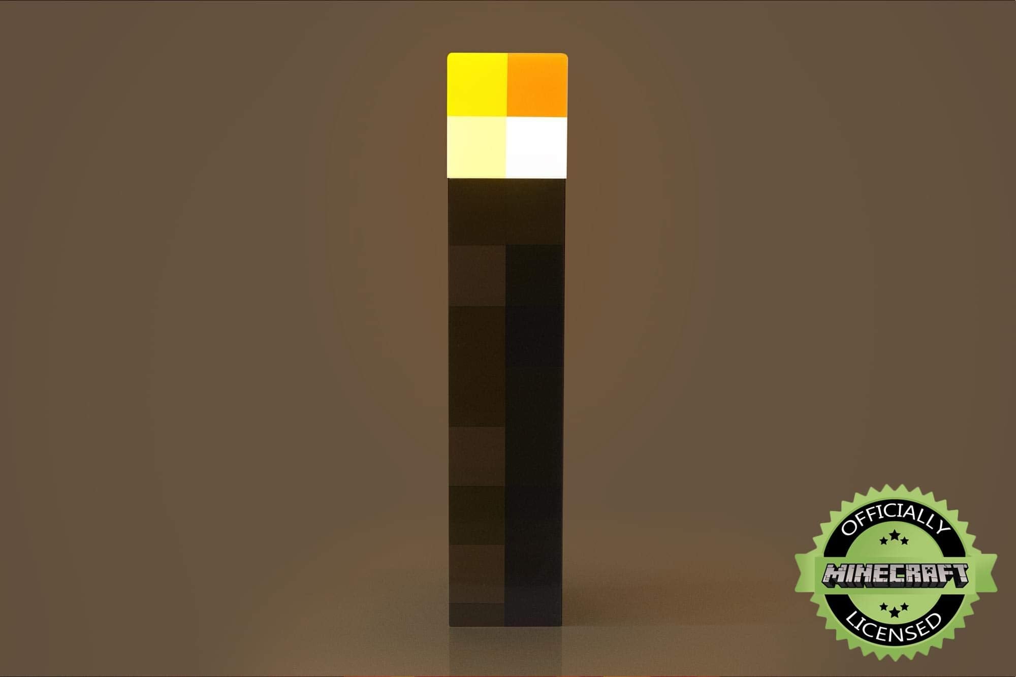 Minecraft Brownstone Torch Lamp on a bedside table for cozy reading glow.