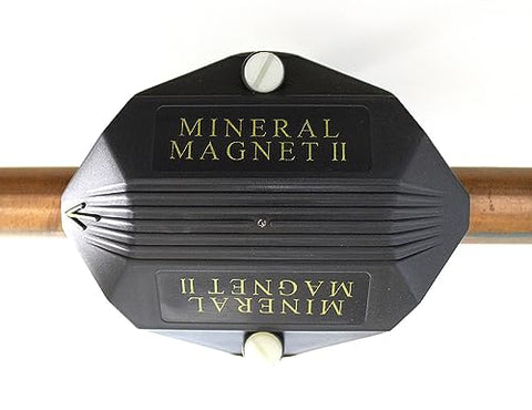 Mineral Magnet II salt-free water descaler in action reduces scale buildup.