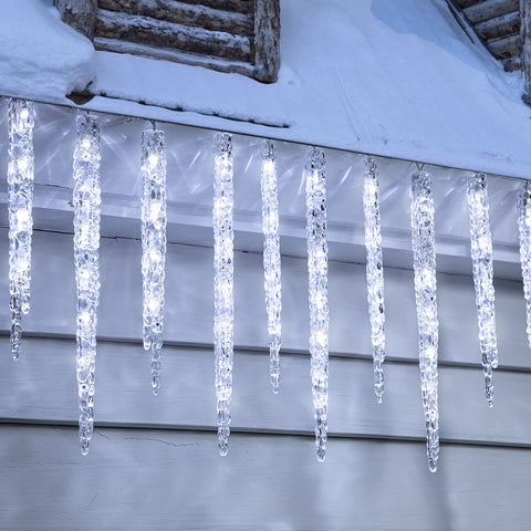 Minetom Icicle Lights illuminate outdoor eaves with twinkling tubes for festive curb appeal.