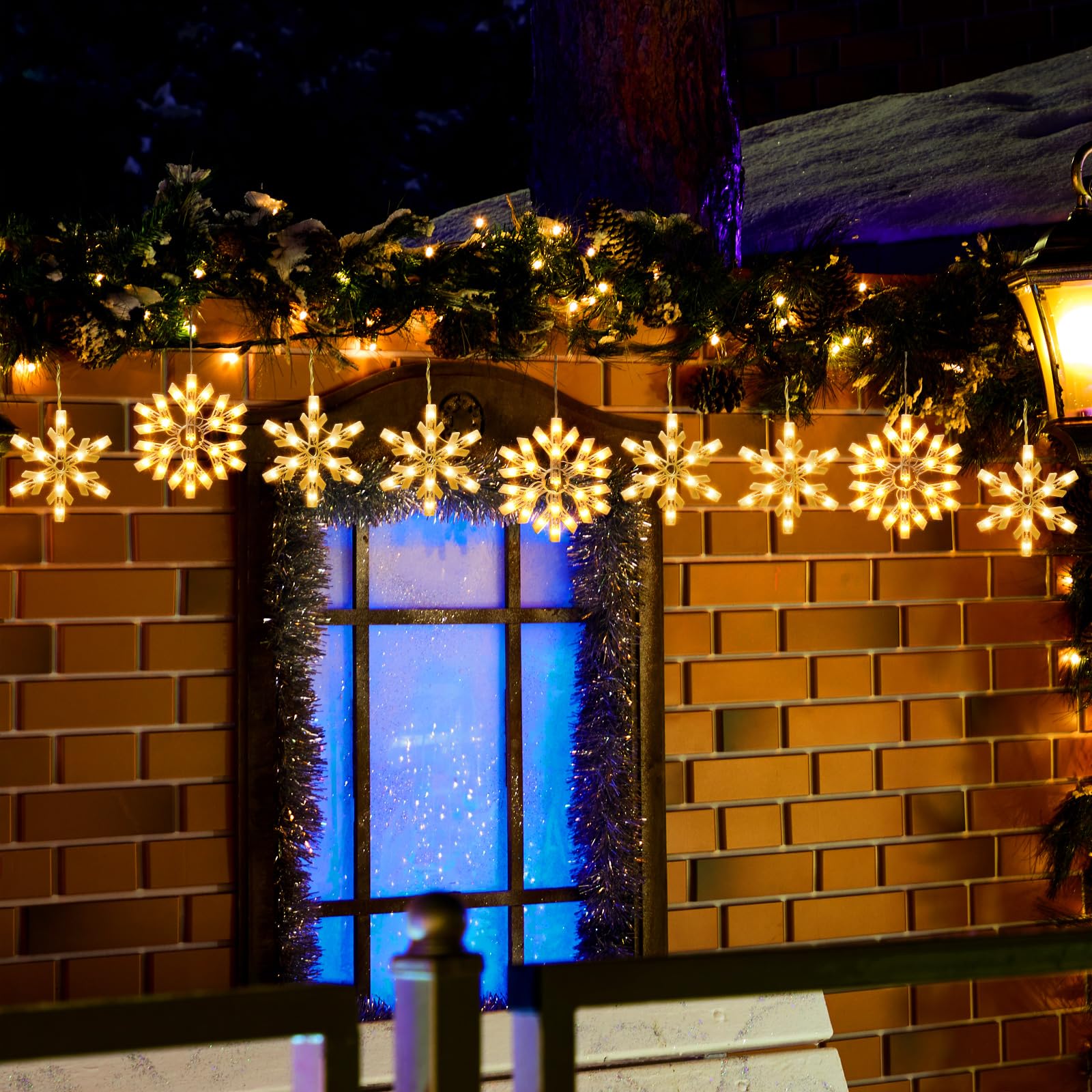 Minetom Snowflake drops form a graceful cascading glow across your yard.