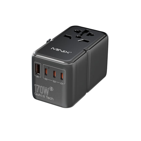 MINIX 170W GaN III travel adapter front view charging a laptop on the go
