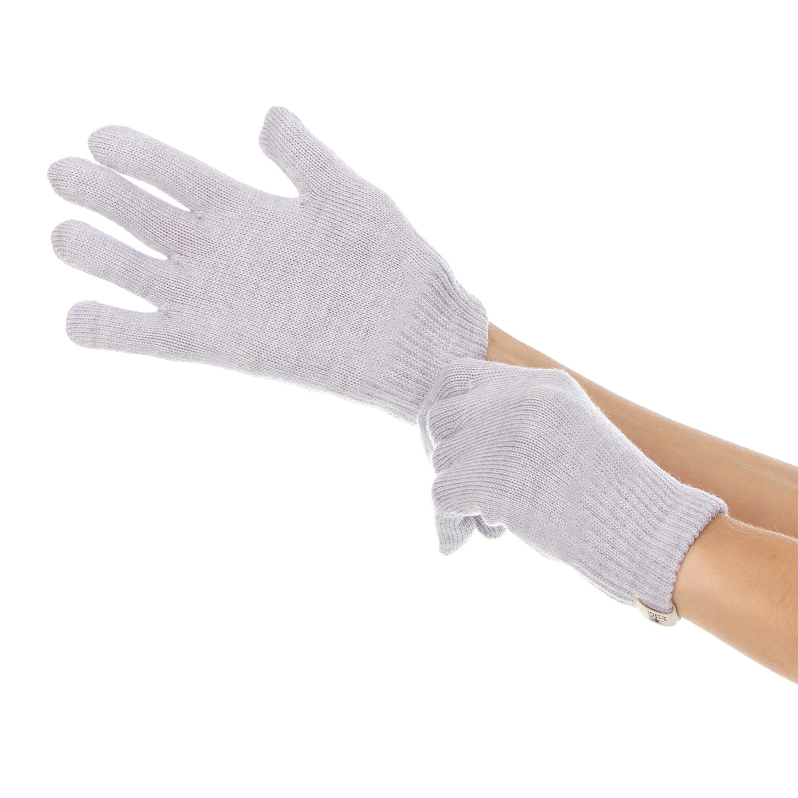Minus33 Merino Wool Glove Liner supporting three-season wear during activities.
