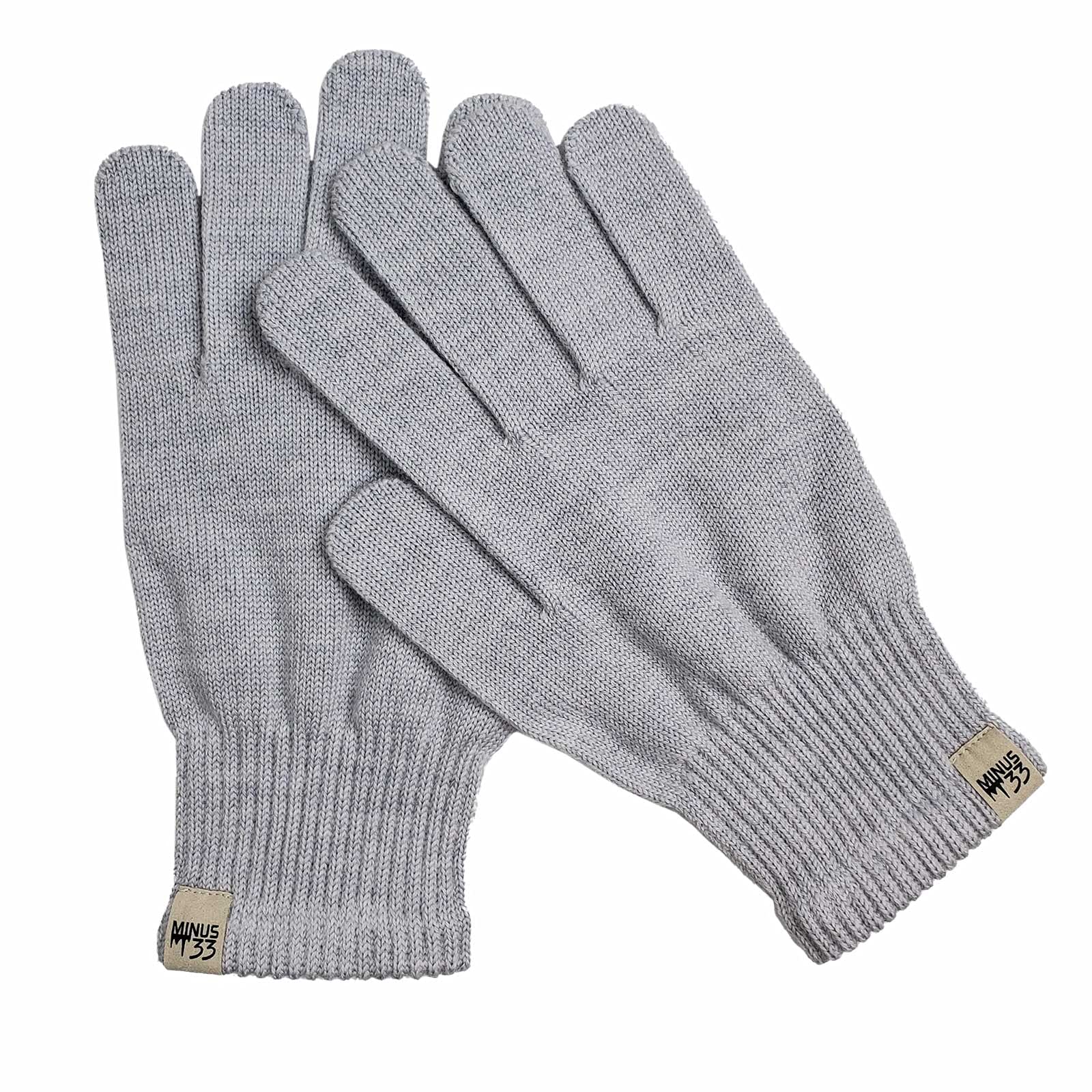 Minus33 Merino Wool Glove Liner used as a base layer for added warmth.