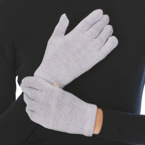 Minus33 Merino Wool Glove Liner worn under gloves for enhanced warmth.