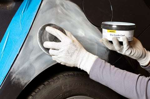 Powder-dispensing unit of Mirka Dry Guide Coat demonstrates fast, solvent-free application