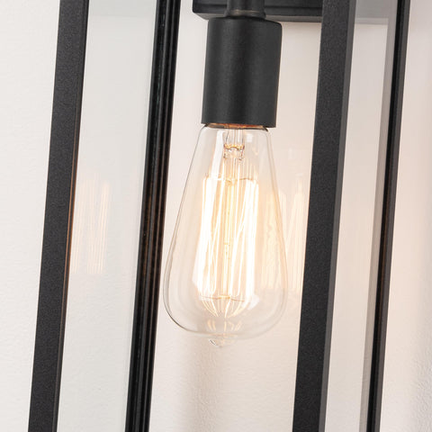 Mirrea 18-inch sconce on wall providing evening illumination