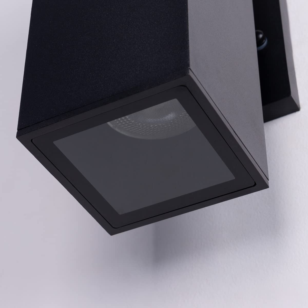 Mirrea two-pack outdoor lights illuminate entryways with inviting ambience.