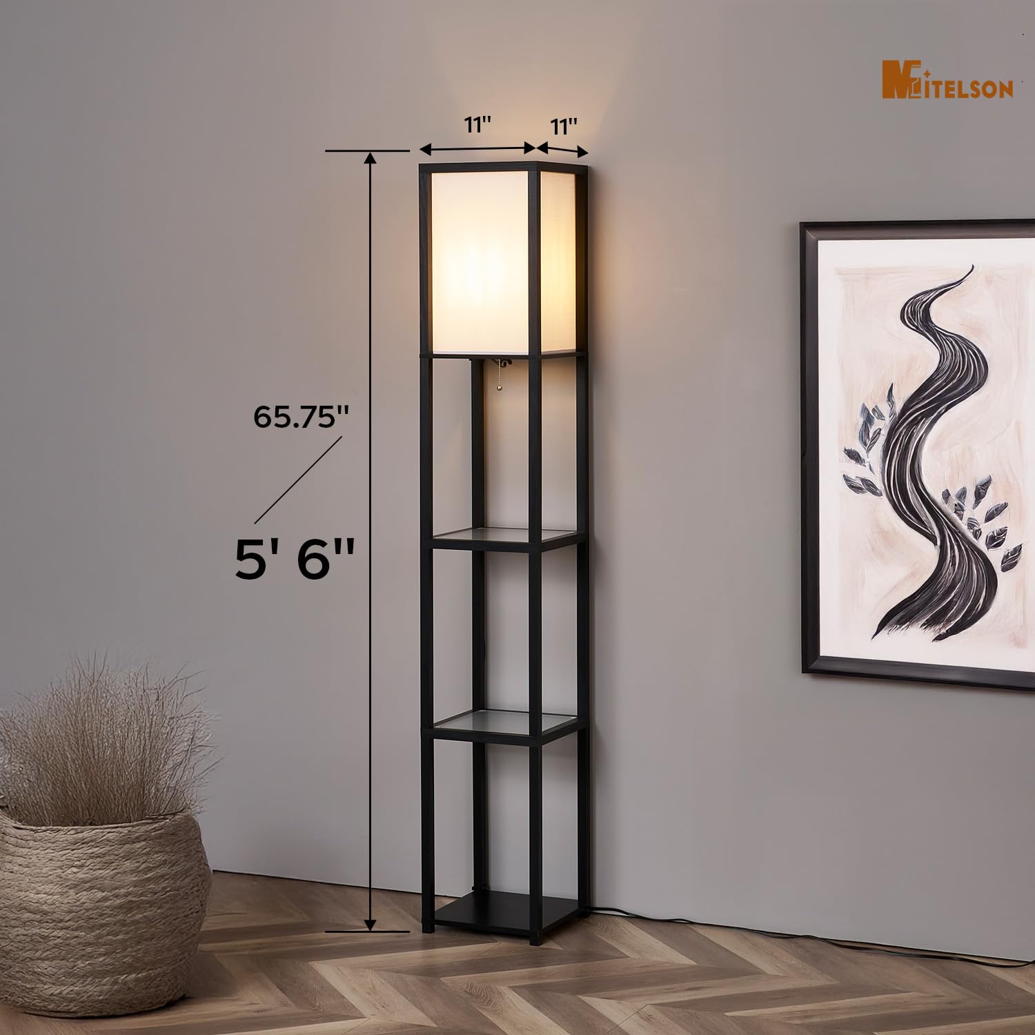 MITELSON floor lamp with shelves lit, showing warm ambient light and shelf visibility.