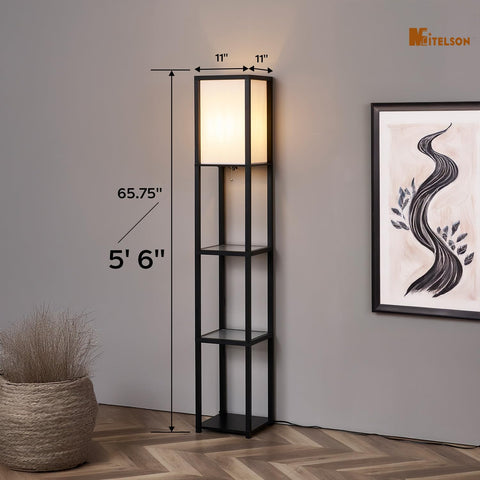 MITELSON floor lamp with shelves lit, showing warm ambient light and shelf visibility.
