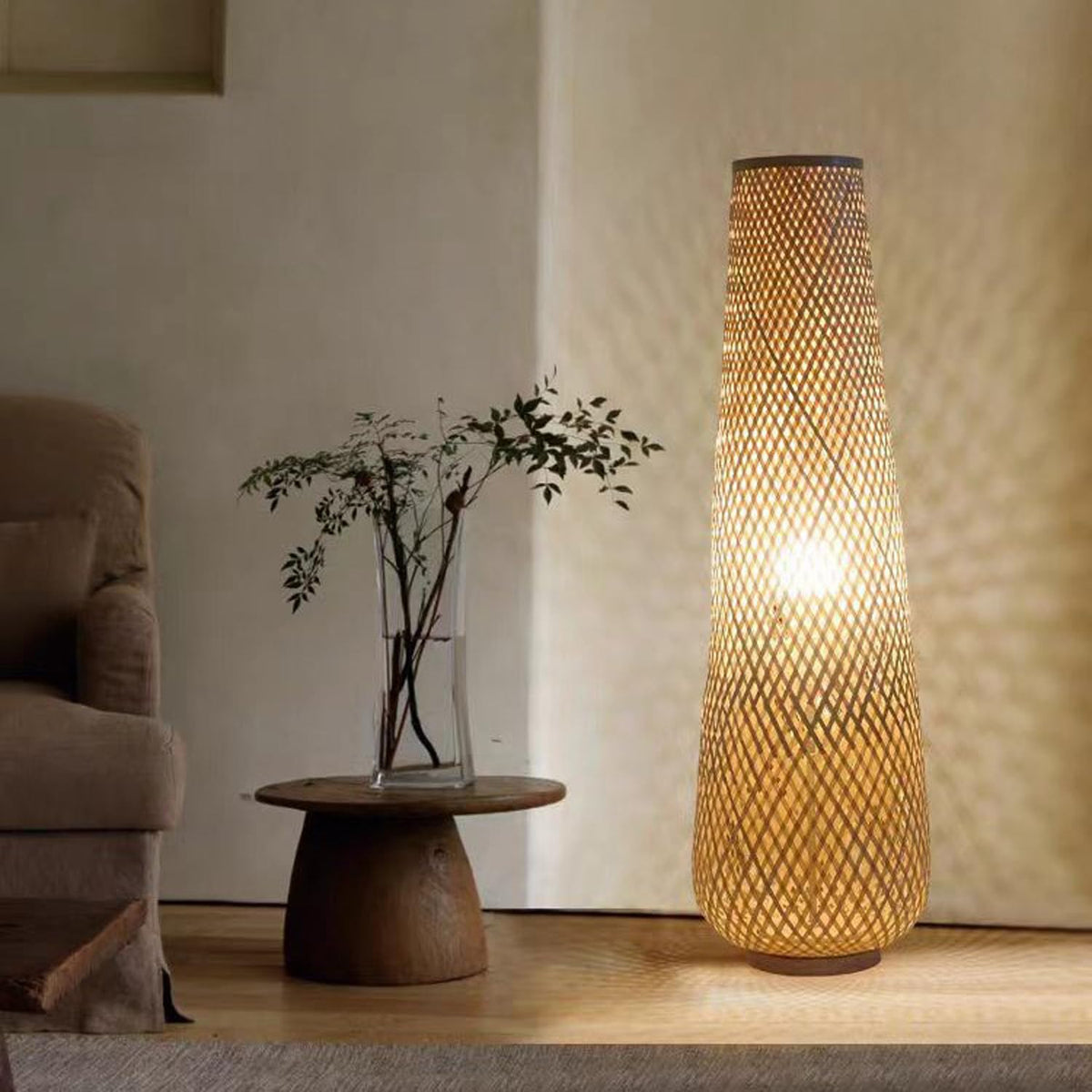 MIXL hand-woven bamboo lamp creates a warm, cozy living room ambiance.