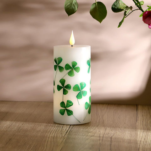 MIYA LIFE St Patrick's Day flameless candle with pressed clover provides lasting luck-themed decor.