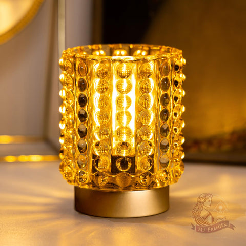 MJ PREMIER battery-operated lamp with yellow base provides warm, portable illumination for cozy corners.