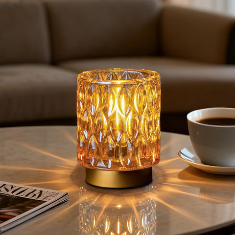 MJ Premier crystal lamp with amber base offers ambient glow on tabletops.