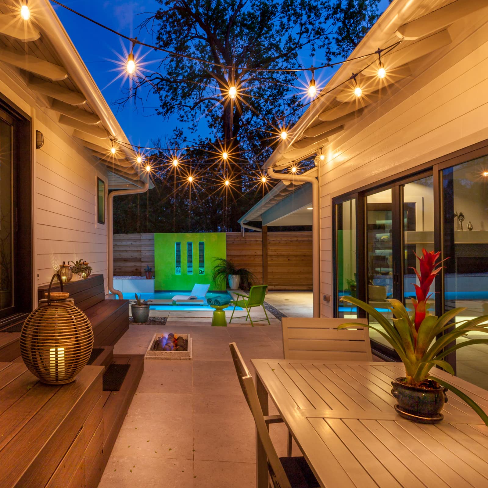 Mlambert cafe ambience created by 96ft LED outdoor string lights.