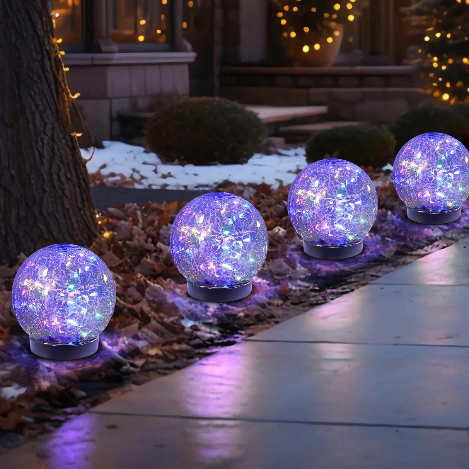 MLKNK solar globe light with cracked glass ball illuminating an outdoor path.