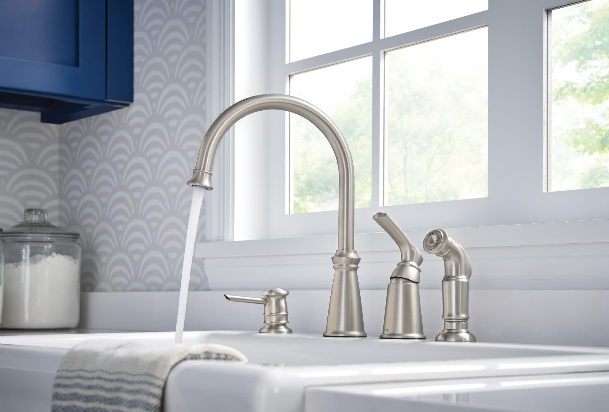 Built-in soap dispenser in action with soap being dispensed