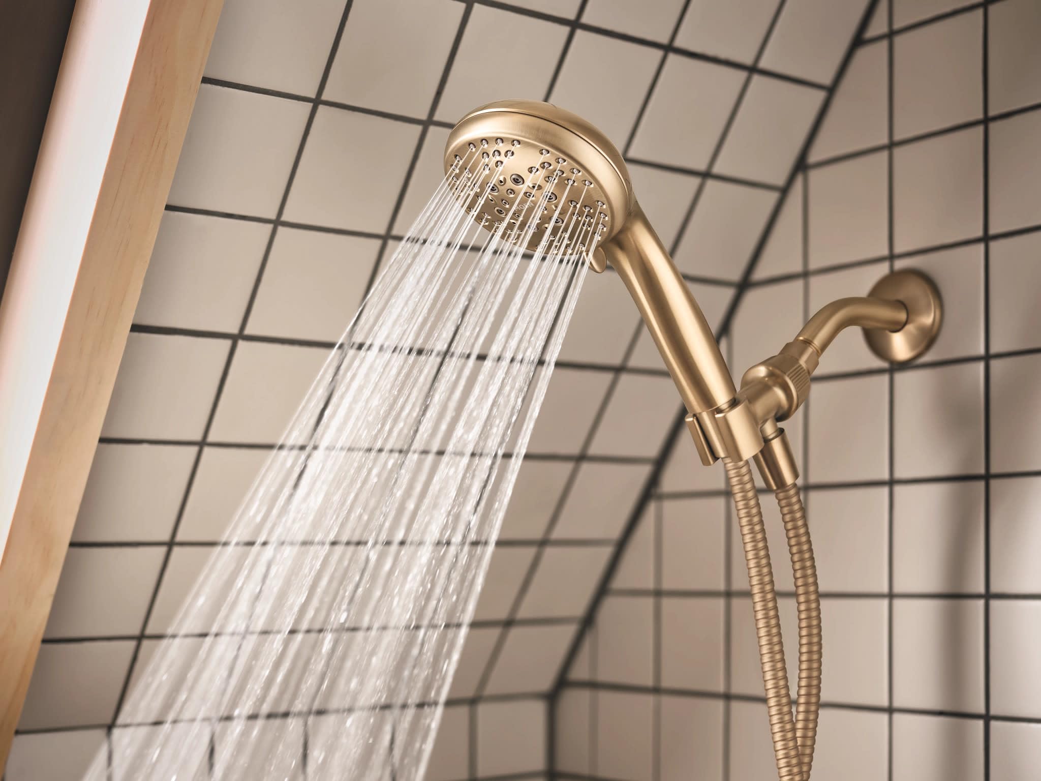 Moen Beric Bronzed Gold valve included highlights reliable temperature balance for safe showers.