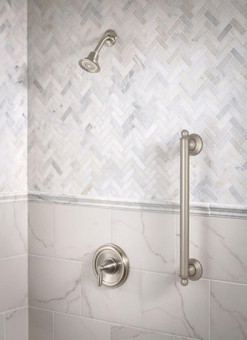 Moen Brantford brushed nickel trim handle close-up highlights smooth operation.