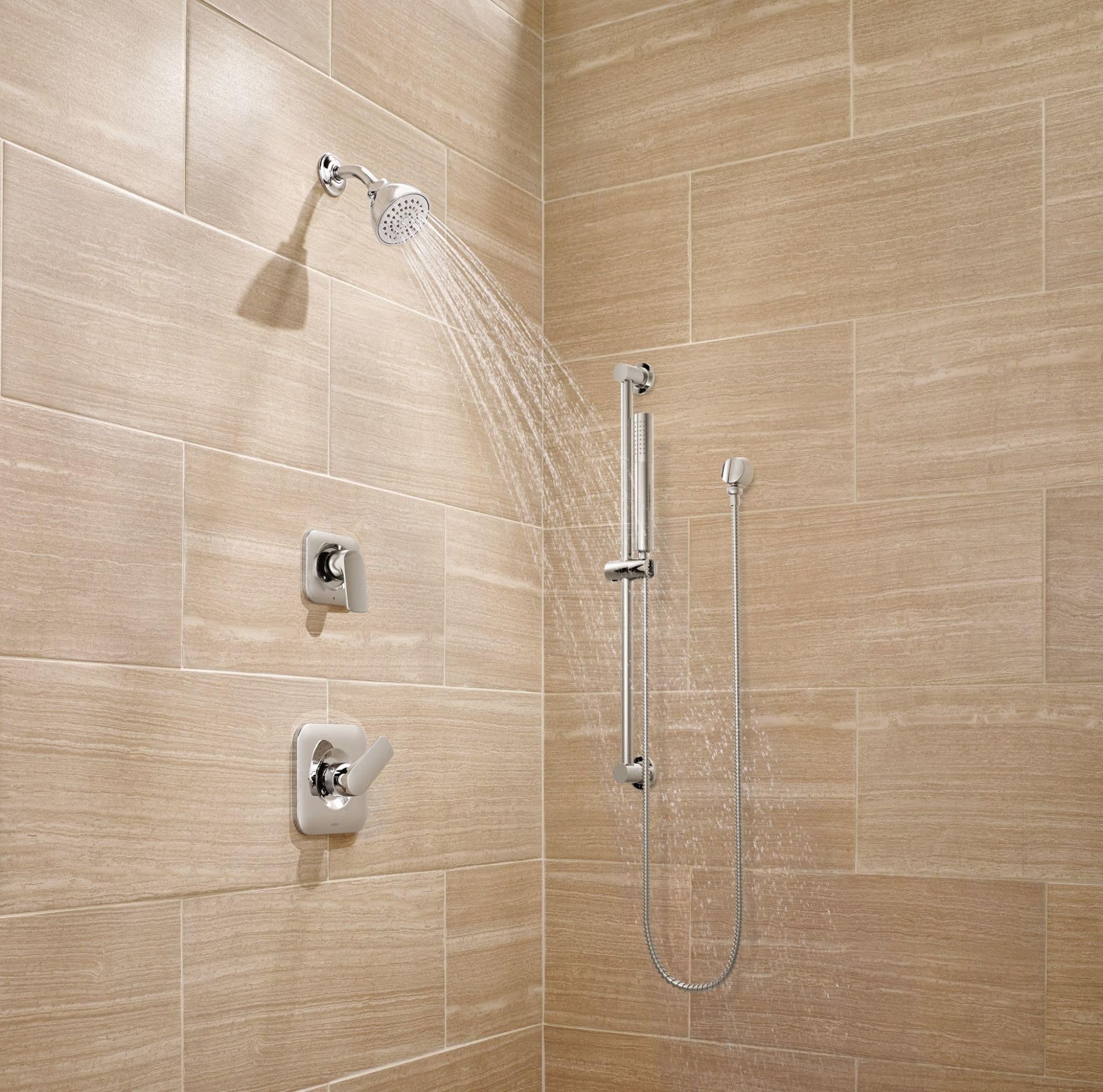 Brushed nickel Drop Ell by Moen blends with contemporary hardware while delivering steady water flow.