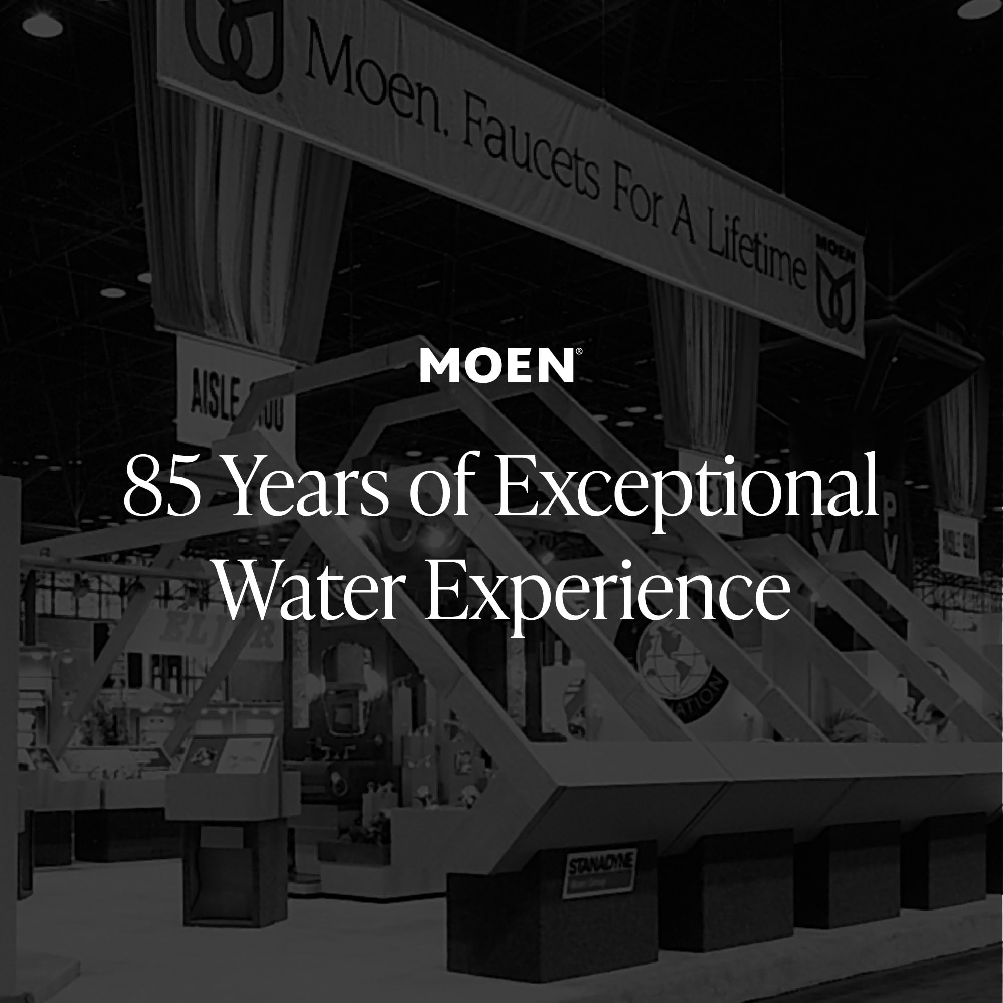 Moen Genta LX matte black faucet side view highlights contemporary silhouette and easy operation.