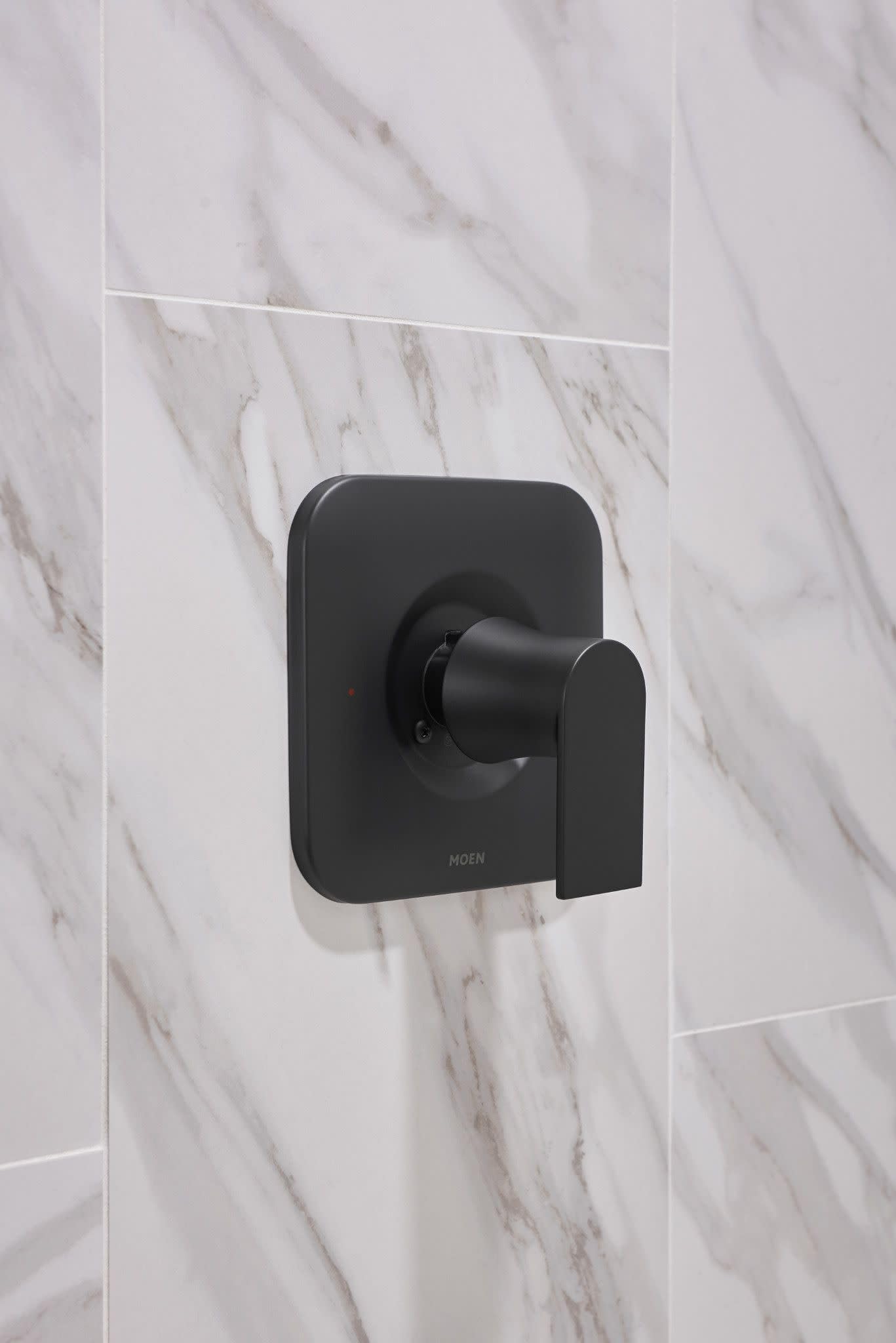 Moen Genta LX trim kit coordinates with other Genta LX accessories.