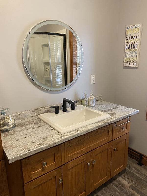 Moen Genta matte-black finish complements contemporary vanity design